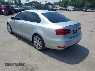 2014 Volkswagen Jetta GLI Autobahn with VIN 3VW5T7AJXEM310901, listed as a IAAI auction lot 42622301 with 139,821 mi miles and . Bid and sale history available at DreamBid. Image 3.