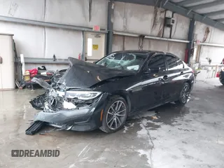 2020 BMW 3 Series 330i xDrive with VIN 3MW5R7J0XL8B23542, listed as a IAAI auction lot 40267310 with 1 mi miles. Bid and sale history available at carsss.com. Image 2.