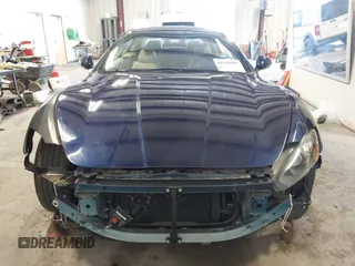 2015 Maserati GranTurismo Convertible Sport with VIN ZAM45MMA5F0141129, listed as a IAAI auction lot 41538585 with 11,267 mi miles. Bid and sale history available at carsss.com. Image 13.