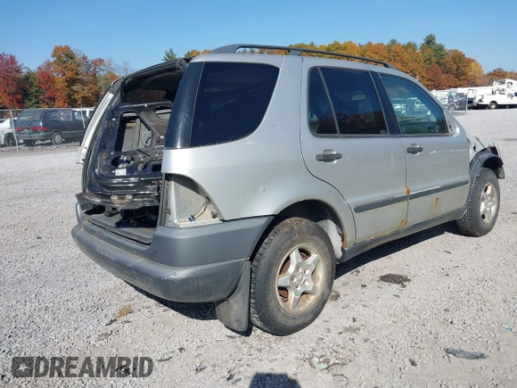 1999 Mercedes-Benz M 320/430/500 with VIN 4JGAB54E5XA086715, listed as a IAAI auction lot 41546385 with 188,551 mi miles and . Bid and sale history available at DreamBid. Image 4.