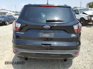 2017 Ford Escape SE z VIN 1FMCU0G92HUD20328, wystawiony jako Copart lot #55181485 z przebiegiem Nie podano mil oraz Szkoda całkowita • Salvage title. Historia ofert i sprzedaży dostępna na DreamBid. Obrazek 6.