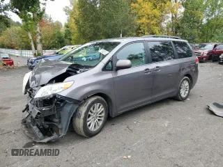 2013 Toyota Sienna XLE AAS with VIN 5TDYK3DCXDS333764, listed as a Copart auction lot 77682814 with 131,915 mi miles and Salvage Title. Bid and sale history available at carsss.com. Image 1.