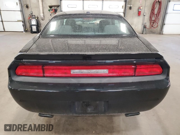 2013 Dodge Challenger R/T z VIN 2C3CDYBT9DH501059, wystawiony jako Copart lot #55139865 z przebiegiem 95 112 mil mil oraz Szkoda całkowita • Salvage title. Historia ofert i sprzedaży dostępna na DreamBid. Obrazek 6.