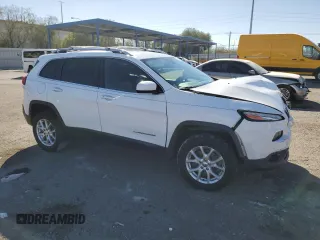 2016 Jeep Cherokee Latitude with VIN 1C4PJMCS6GW104936, listed as a Copart auction lot 73612764 with 117,879 mi miles and Salvage Title. Bid and sale history available at carsss.com. Image 4.