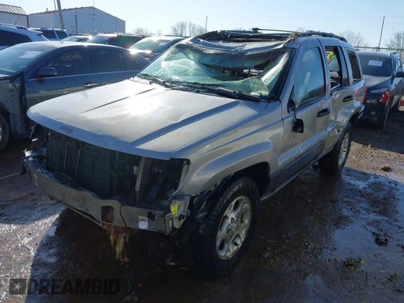 2001 Jeep Grand Cherokee Laredo with VIN 1J4GX48S51C735316, listed as a IAAI auction lot 41752349 with 214,101 mi miles and . Bid and sale history available at DreamBid. Image 2.
