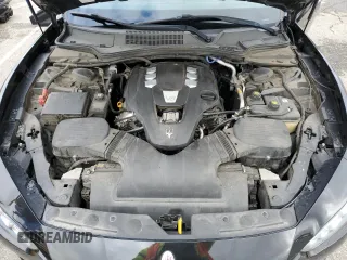 2015 Maserati Ghibli z VIN ZAM57XSA7F1148872, wystawiony jako Copart lot #48454165 z przebiegiem 72 232 mil mil oraz Szkoda całkowita • Salvage title. Historia ofert i sprzedaży dostępna na DreamBid. Obrazek 11.