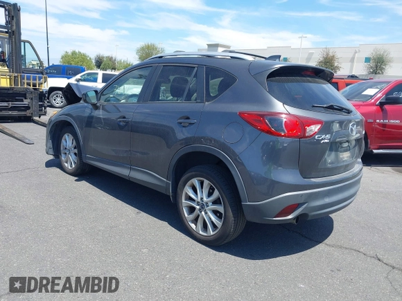2014 Mazda CX-5 Grand Touring with VIN JM3KE4DY8E0391317, listed as a IAAI auction lot 41871641 with 77,048 mi miles. Bid and sale history available at carsss.com. Image 3.