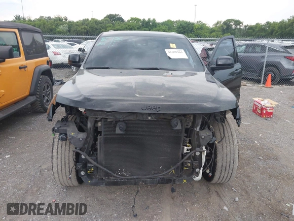 2020 Jeep Grand Cherokee Laredo E with VIN 1C4RJEAG7LC324904, listed as a IAAI auction lot 42600961 with 93,444 mi miles and . Bid and sale history available at DreamBid. Image 6.