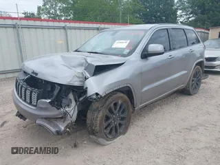 2017 Jeep Grand Cherokee Altitude with VIN 1C4RJEAG9HC788932, listed as a IAAI auction lot 42068148 with 161,325 mi miles and . Bid and sale history available at DreamBid. Image 2.