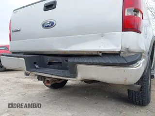 2005 Ford F-150 XLT with VIN 1FTPW14505KC98909, listed as a IAAI auction lot 41905480 with 174,198 mi miles. Bid and sale history available at carsss.com. Image 14.