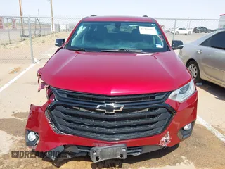 2021 Chevrolet Traverse LT with VIN 1GNERHKW9MJ117918, listed as a IAAI auction lot 42470808 with 77,535 mi miles and . Bid and sale history available at DreamBid. Image 12.