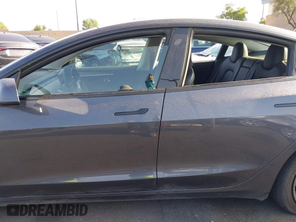 2023 Tesla Model 3 with VIN 5YJ3E1EA4PF427022, listed as a IAAI auction lot 42465964 with 169,346 mi miles and . Bid and sale history available at DreamBid. Image 14.