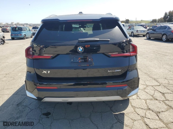 2024 BMW X1 xDrive28i with VIN WBX73EF09R5Z39211, listed as a Copart auction lot 52126935 with 4,581 mi miles and Salvage Title. Bid and sale history available at carsss.com. Image 6.