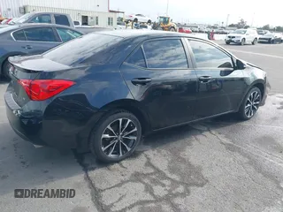 2019 Toyota Corolla L with VIN 5YFBURHE6KP892992, listed as a IAAI auction lot 42057187 with 80,304 mi miles and . Bid and sale history available at DreamBid. Image 4.