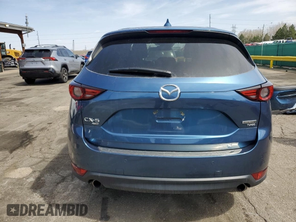 2021 Mazda CX-5 Grand Touring Reserve with VIN JM3KFBAY8M0384498, listed as a Copart auction lot 52013445 with 20,469 mi miles and Salvage Title. Bid and sale history available at carsss.com. Image 6.