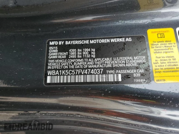 2015 BMW 2 Series 228i with VIN WBA1K5C57FV474037, listed as a Copart auction lot 87857635 with 91,333 mi miles and Salvage title. Bid and sale history available at DreamBid. Image 12.