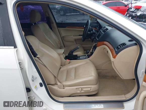 2007 Acura TSX Navi with VIN JH4CL96987C010023, listed as a IAAI auction lot 42026153 with 225,003 mi miles and . Bid and sale history available at DreamBid. Image 5.