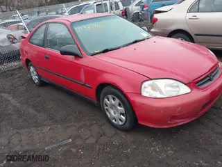 1999 Honda Civic DX with VIN 1HGEJ622XXL038821, listed as a IAAI auction lot 41725988 with 999,999 mi miles. Bid and sale history available at carsss.com. Image 1.