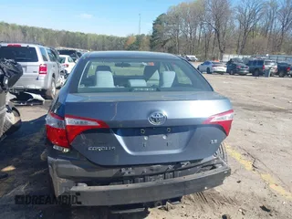 2015 Toyota Corolla L with VIN 2T1BURHE1FC295917, listed as a IAAI auction lot 41869602 with 99,773 mi miles and . Bid and sale history available at DreamBid. Image 16.