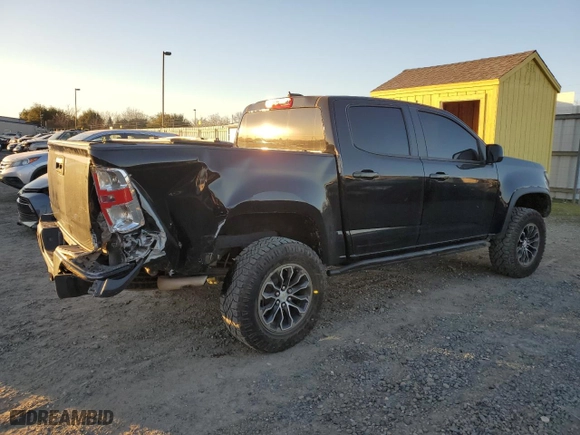 2021 Chevrolet Colorado 4WD ZR2 with VIN 1GCGTEEN6M1169379, listed as a Copart auction lot 87615955 with 34,487 mi miles and Salvage Title. Bid and sale history available at carsss.com. Image 3.