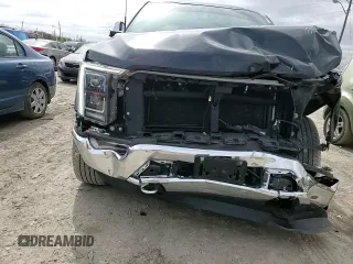 2021 Ford F-150 XL with VIN 1FTFW1E83MFB66545, listed as a Copart auction lot 49702825 with 84,078 mi miles and Salvage title. Bid and sale history available at DreamBid. Image 11.