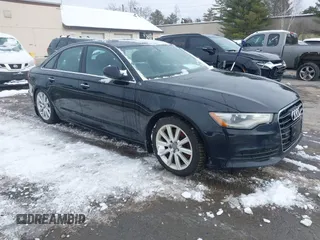 2015 Audi A6 2.0T Premium Plus with VIN WAUGFAFC7FN012403, listed as a IAAI auction lot 41574681 with 189,804 mi miles. Bid and sale history available at carsss.com. Image 1.