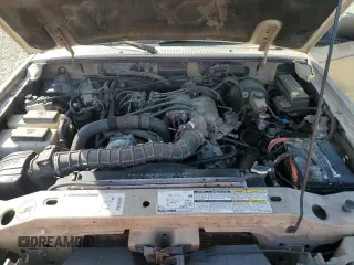1999 Ford Ranger XL with VIN 1FTYR14V7XPB20433, listed as a Copart auction lot 51450535 with 103,057 mi miles and Salvage title. Bid and sale history available at DreamBid. Image 11.