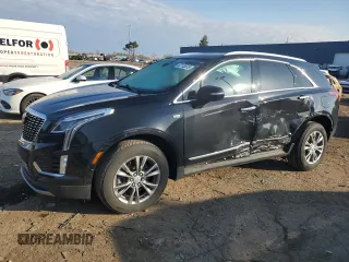 2021 Cadillac XT5 AWD Premium Luxury with VIN 1GYKNDRS2MZ176369, listed as a Copart auction lot 52113875 with 74,666 mi miles and Clean Title. Bid and sale history available at carsss.com. Image 1.