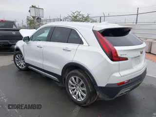 2022 Cadillac XT4 FWD Premium Luxury with VIN 1GYFZCR49NF100393, listed as a IAAI auction lot 42497187 with 23,672 mi miles and . Bid and sale history available at DreamBid. Image 3.