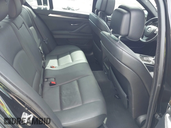2013 BMW 5 Series 528i with VIN WBAXG5C51DDY33333, listed as a IAAI auction lot 41685179 with 94,936 mi miles and . Bid and sale history available at carsss.com. Image 8.