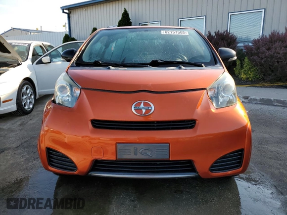 2012 Scion iQ z VIN JTNJJXB0XCJ020404, wystawiony jako Copart lot #62157565 z przebiegiem 82 869 mil mil oraz Nie do naprawy • Non repairable. Historia ofert i sprzedaży dostępna na DreamBid. Obrazek 5.