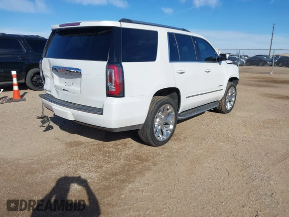 2020 GMC Yukon Denali with VIN 1GKS2CKJ3LR260455, listed as a IAAI auction lot 41690495 with 92,498 mi miles. Bid and sale history available at carsss.com. Image 4.