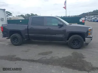 2015 Chevrolet Silverado 1500 LT with VIN 3GCUKREC9FG519510, listed as a IAAI auction lot 42026865 with 119,510 mi miles. Bid and sale history available at carsss.com. Image 13.