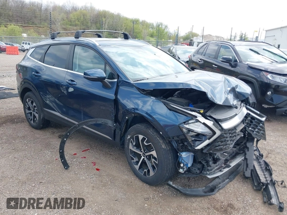 2023 Kia Sportage EX with VIN KNDPVCAGXP7104090, listed as a IAAI auction lot 42144158 with 26,983 mi miles and . Bid and sale history available at DreamBid. Image 1.