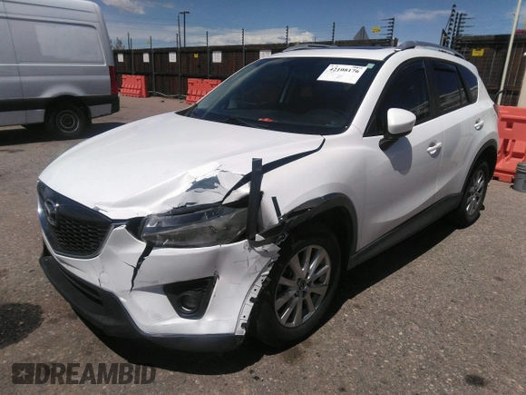 2014 Mazda CX-5 Touring with VIN JM3KE2CY7E0364311, listed as a IAAI auction lot 42108176 with 90,506 mi miles and . Bid and sale history available at DreamBid. Image 17.