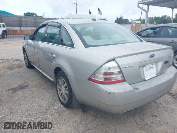 2008 Ford Taurus SEL with VIN 1FAHP24W48G125035, listed as a IAAI auction lot 42149505 with 201,502 mi miles. Bid and sale history available at carsss.com. Image 3.