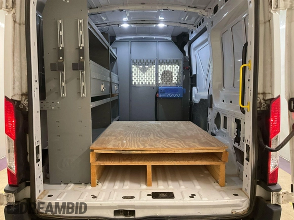 2021 Ford Transit Cargo with VIN 1FTBR1CG4MKA80751, listed as a IAAI auction lot 42859733 with 80,844 mi miles and . Bid and sale history available at DreamBid. Image 20.