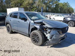 2023 Mazda CX-50 S Select with VIN 7MMVABAM8PN146630, listed as a Copart auction lot 49590615 with 24,215 mi miles and Salvage Title. Bid and sale history available at DreamBid. Image 4.