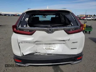 2021 Honda CR-V Touring z VIN 2HKRW2H92MH661297, wystawiony jako Copart lot #55984455 z przebiegiem 23 437 mil mil oraz Szkoda całkowita • Salvage title. Historia ofert i sprzedaży dostępna na DreamBid. Obrazek 6.