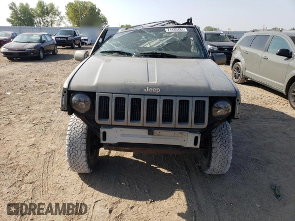 1998 Jeep Grand Cherokee Limited with VIN 1J4GZ78Y2WC146974, listed as a Copart auction lot 71435484 with 192,996 mi miles and Salvage Title. Bid and sale history available at carsss.com. Image 5.
