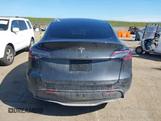 2024 Tesla Model Y with VIN 7SAYGDED8RF213796, listed as a IAAI auction lot 41634130 with 7,710 mi miles and . Bid and sale history available at DreamBid. Image 15.