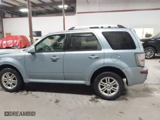 2009 Mercury Mariner Premier with VIN 4M2CU97G19KJ07210, listed as a IAAI auction lot 41451763 with 154,122 mi miles. Bid and sale history available at carsss.com. Image 14.