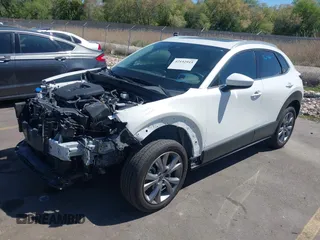 2024 Mazda CX-30 S Premium with VIN 3MVDMBDM8RM633580, listed as a IAAI auction lot 42152915 with 18,679 mi miles and . Bid and sale history available at DreamBid. Image 17.