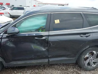 2022 Hyundai Santa Fe SE z VIN 5NMS14AJ9NH429794, wystawiony jako IAAI lot #42370994 z przebiegiem 36 649 mil mil oraz . Historia ofert i sprzedaży dostępna na DreamBid. Obrazek 14.