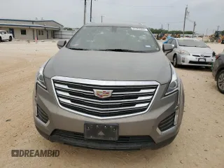 2019 Cadillac XT5 FWD with VIN 1GYKNARS9KZ107402, listed as a Copart auction lot 51352805 with 94,147 mi miles and Clean title. Bid and sale history available at DreamBid. Image 5.