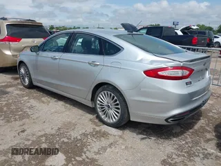 2014 Ford Fusion Titanium with VIN 3FA6P0K99ER181842, listed as a IAAI auction lot 42093066 with 115,798 mi miles. Bid and sale history available at carsss.com. Image 3.