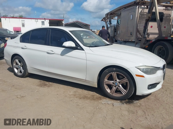 2015 BMW 3 Series 320i xDrive with VIN WBA3C3C58FK201748, listed as a IAAI auction lot 42678404 with 115,043 mi miles and . Bid and sale history available at DreamBid. Image 1.