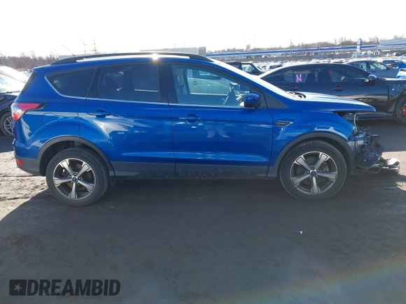 2017 Ford Escape SE with VIN 1FMCU9G91HUE28282, listed as a IAAI auction lot 41471957 with 23,552 mi miles. Bid and sale history available at carsss.com. Image 13.