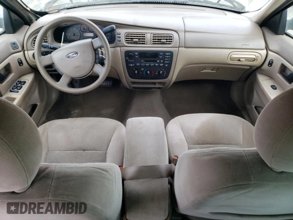 2004 Ford Taurus SE with VIN 1FAFP53U34G129631, listed as a Copart auction lot 45054375 with 182,089 mi miles and Salvage title. Bid and sale history available at DreamBid. Image 8.