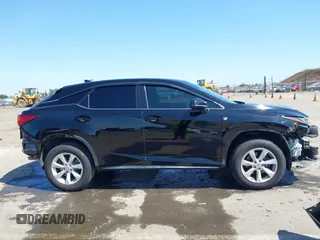 2016 Lexus RX 350 z VIN 2T2BZMCA6GC002373, wystawiony jako IAAI lot #42356683 z przebiegiem 107 067 mil mil oraz . Historia ofert i sprzedaży dostępna na DreamBid. Obrazek 14.